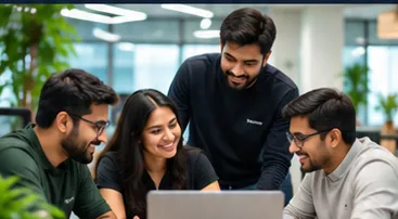 Codetrex team members collaborating around a laptop